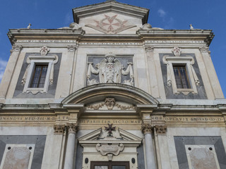 Fototapeta na wymiar Principal facade of the Church of Santo Stefano Knights in Piazza dei Cavalieri, Pisa. Tuscany, Italy.