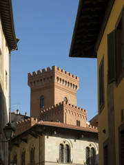 Narrow street in the old town of Pisa, Tuscany Italy