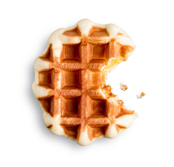Belgian waffle isolated on white background.