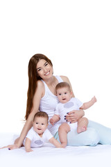 Fototapeta na wymiar angelic babies with mother