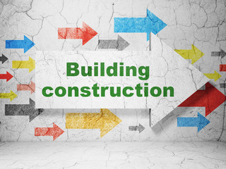 Building construction concept: arrow with Building Construction on grunge wall background