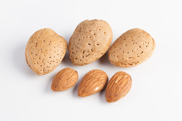 Whole almonds nuts isolated on white background