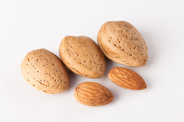 Whole almonds nuts isolated on white background