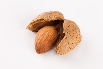 Whole almonds nuts isolated on white background