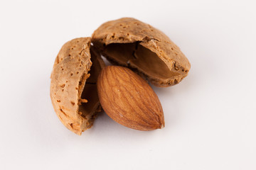 Whole almonds nuts isolated on white background