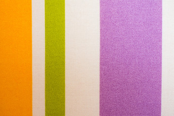 Fototapeta premium Fabric texture of multi-colored vertical stripes
