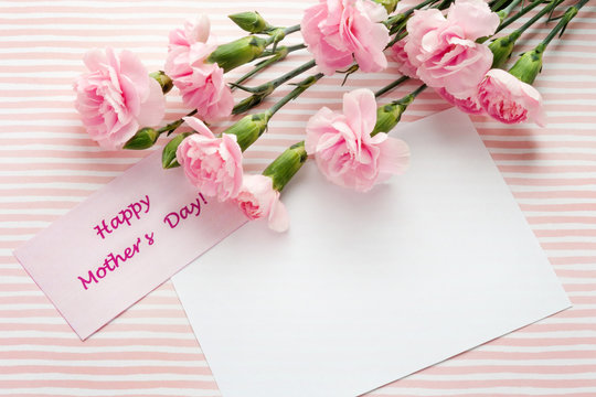 Mother's day greeting card. Bouquet of pink carnations