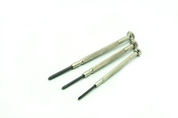 Set of mini old screwdrivers with white background.