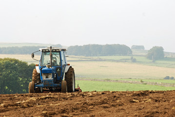 Obraz premium Tractor Ploughing