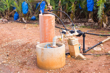 Irrigation systems, pipes and faucets for watering.