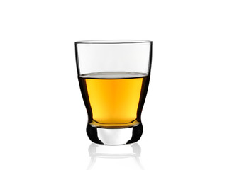 Whiskey in a shot glass isolated with reflection on a white background