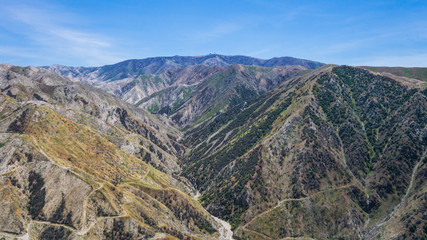 View from high above California canyons and mountains near Angeles National Forest.