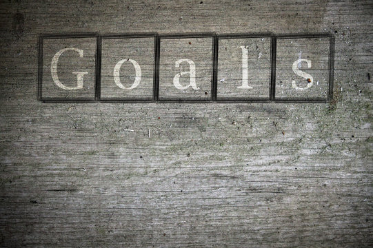 goals writen on a wall background