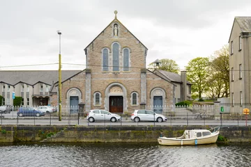 Deurstickers traditional Irish church at galway city © jon_chica