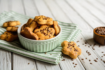 Homemade cheese and paprika crackers sprinkled with flax seed
