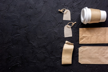 paper bags and plastic cup for take away set top view space for text