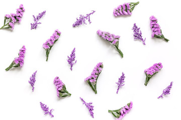 lady morning with macaroons and mauve flowers white desk background top view pattern © 279photo