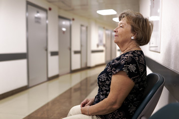 Mature woman waiting at doctor's office