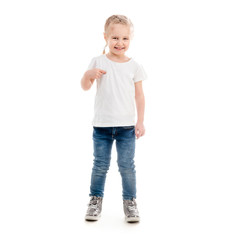 Tiny girl standing pointing at herself, isolated