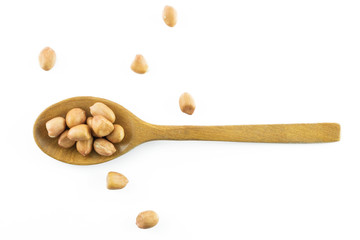 Dried peanut in the wood spoon isolated on white background., This has clipping path.