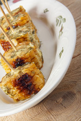 Corn cobs cooked on a grill