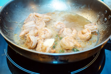 Fried shrimps in the pan for restaurant