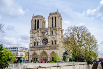 Fototapeta na wymiar Notre-Dame Roman Catholic Cathedral in Paris, a wonderful gothic church renowed for it's architectural beauty and a world wide tourist attraction