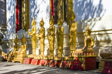 The row of gold Buddha statues in That Luang temple in the centre of Vientiane, Laos