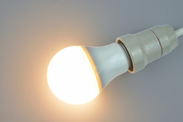Lit up light bulb with light-emitting diode technology of warm light