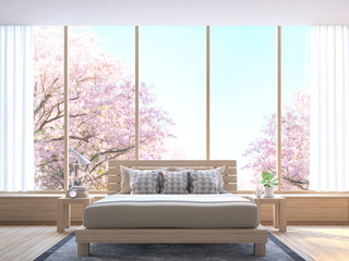 Modern bedroom decorate room with wood  3d rendering image.There wooden floor and  large window Look out to see the tree with pink flowers.