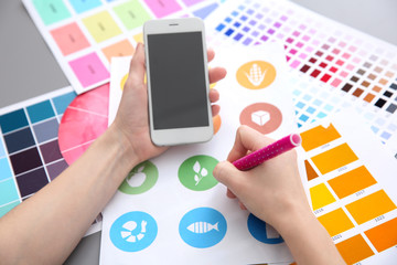 Young designer working in office, closeup