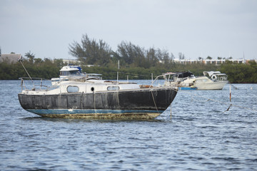 Deteriorated Sailboat Anchored near Thompson Island Key West Florida