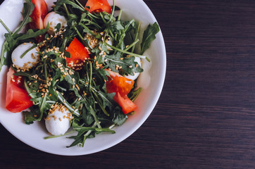Fresh, summer salad with arugula leaves