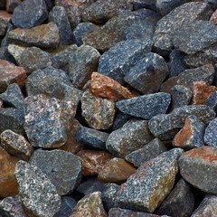 Crushed granite stone texture pattern, detailed rocks background closeup, large textured macro
