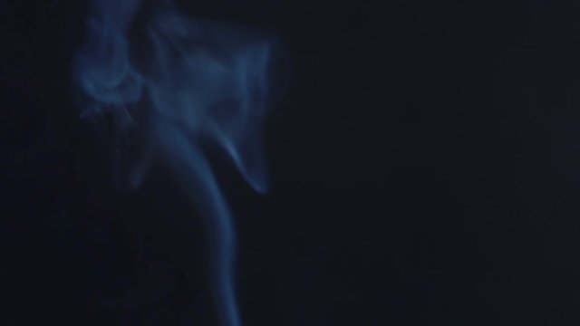 Smoke cigarettes on a black background
