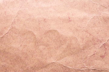 Texture of old shabby and crumpled paper, vintage style, abstract close-up background