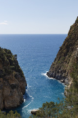 Fototapeta na wymiar Beautiful lagoon framed by steep cliffs