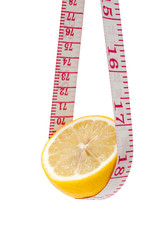 Lemon and tape measure isolated on white background