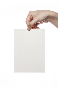 woman hand hold a paper(post card) isolated white.