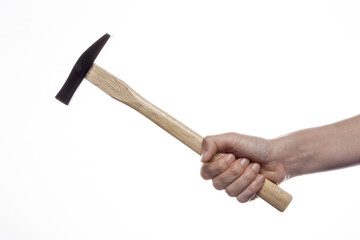 woman hand hold a hammer isolated white.