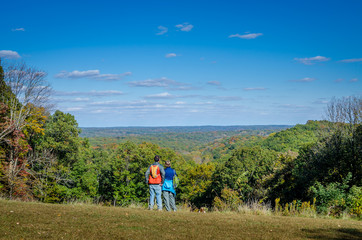 A couple admiring the scenery at Brown County State Park in fall