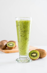 Healthy fresh kiwi smoothie in glass