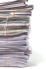 Stack of business papers isolated on white background
