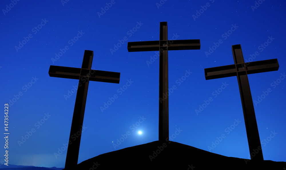 Wall mural Three crosses on a hill