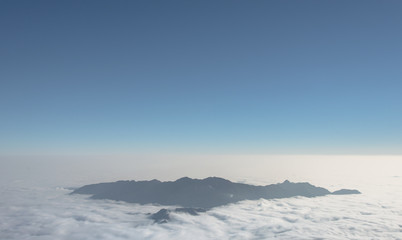 Beautiful mountain ridge in the clouds - Fansipan Mountain in Vietnam