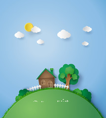 Naklejka premium Little house on the hill with green grass