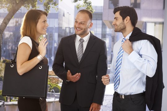 Businessman Introducing New Partner To Colleague