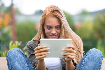 funny faces f a shocked girl and a tablet