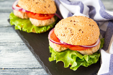 Homemade healthy Turkey Burger with Lettuce and Tomato. selective focus