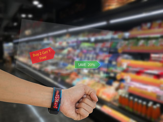 iot,internet of things marketing concept, man use smart watch with augmented reality technology to search discount,promotion at the retail